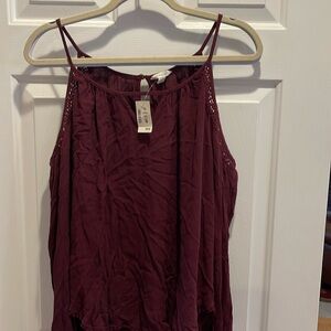 Aeropostale blouse with open shoulder, long sleeves and keyhole back and front.